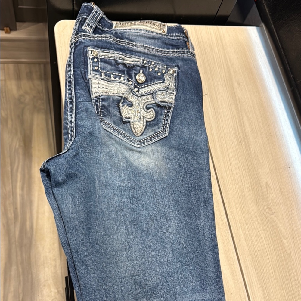 Rock Revival Blue Boot Cut Jeans with Decorative Stitching